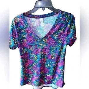 Lularoe XSV Neck navy floral Christy‎ T-shirt. NWT . Pattern on pattern .